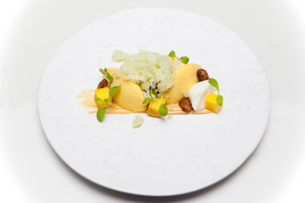 Sweet and refreshing, our dessert of Mango semifreddo, available on the #TasteofHKK menu spr.ly/60158LQaZ