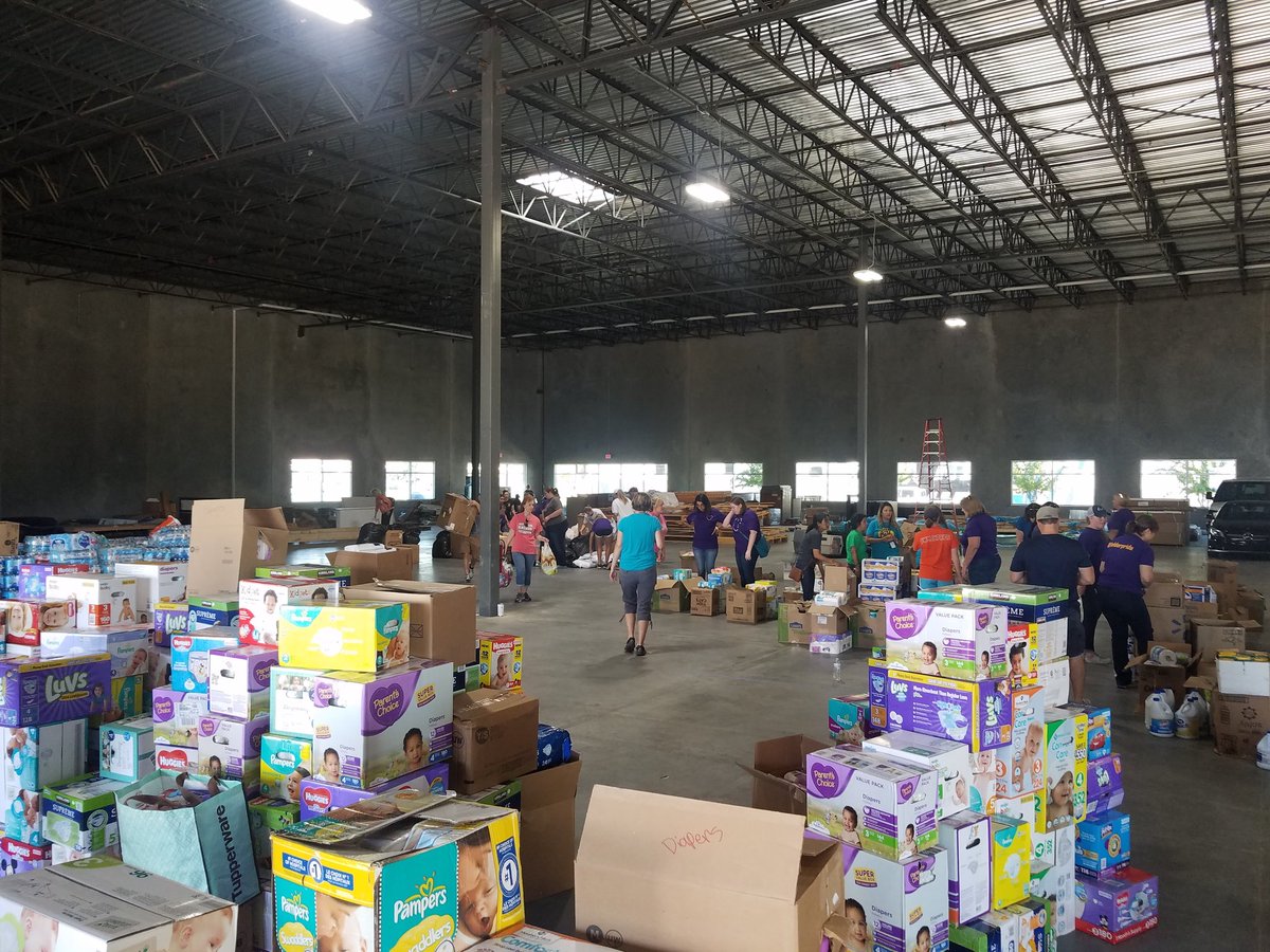 Woolfwade's tweet photo. Valerie Maggitti and the Katy Educators helping out our neighbors #Katyisd #coltconnect #bethelegacy https://t.co/SAyG265eIy