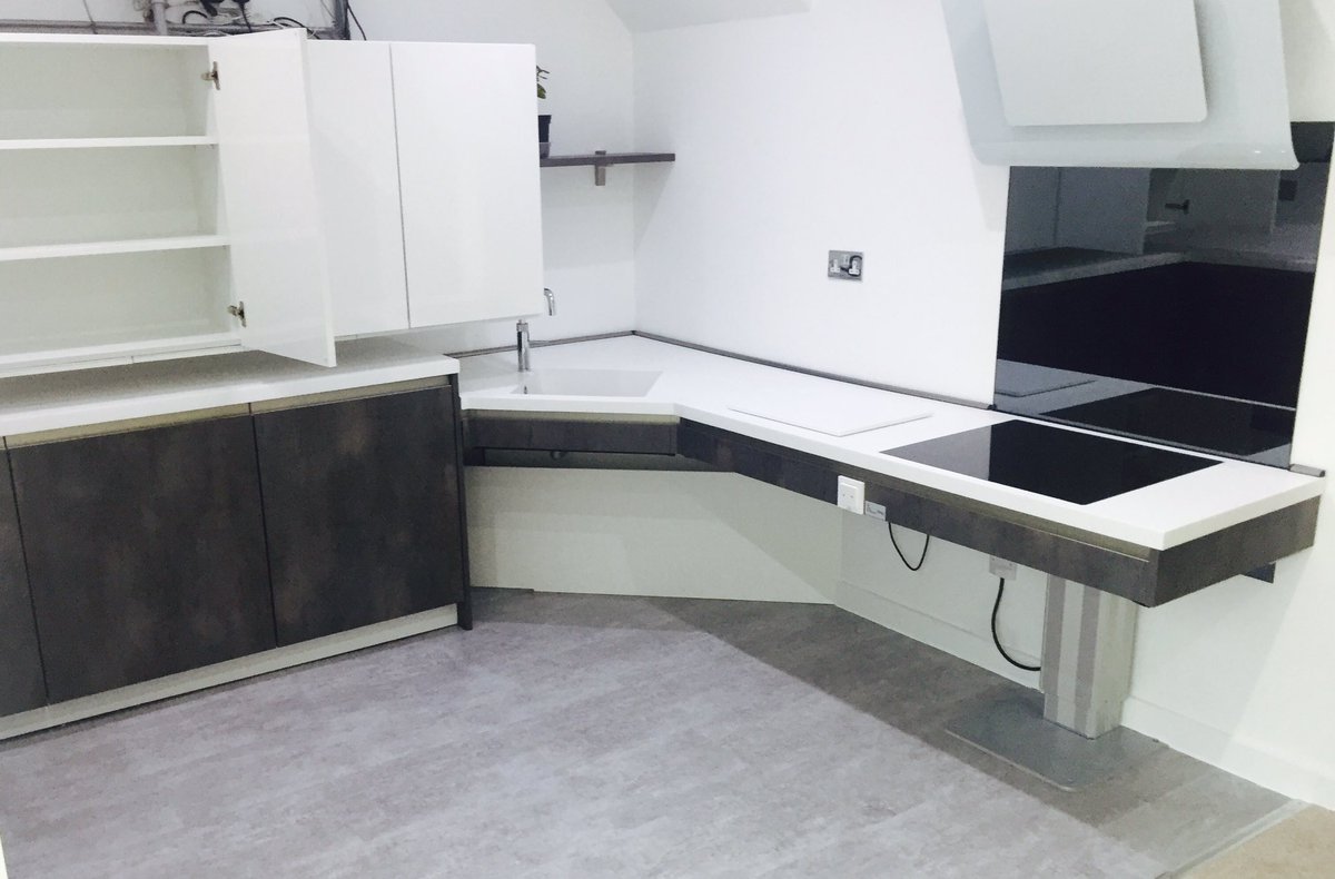 #accessible kitchen completed. Height adjustable worktops, lowering wall units. Unique solution to unique situations. #corian #quooker