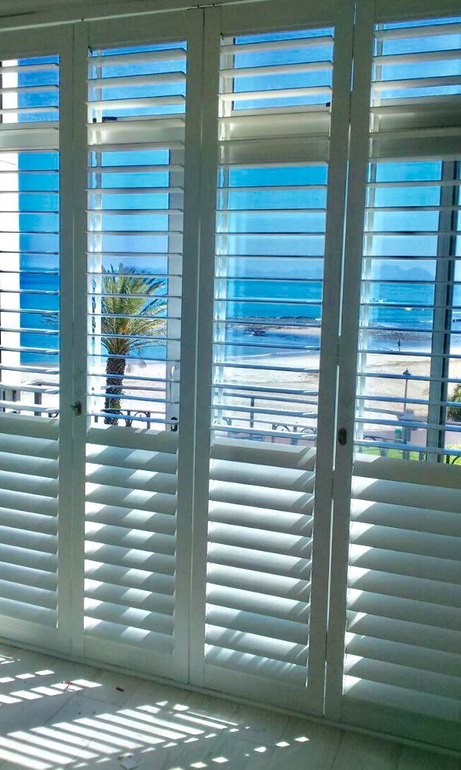 IrnavanWyk's tweet photo. #BeachHouse window treatment at it's best. #ShutterGuard for #Security. Adjustable louvres. Floating #style. #Strand #Helderberg #CapeTown https://t.co/lvs1LWExo9