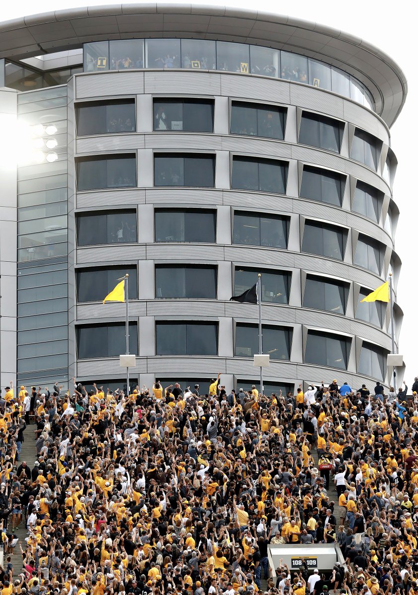 HawkeyeFootball's tweet photo. Truly amazing what 70,000 of our fans can pull off! Started by the fans, executed beautifully, remembered forever | #FanFriday @UIchildrens https://t.co/xN9ySVGQLr