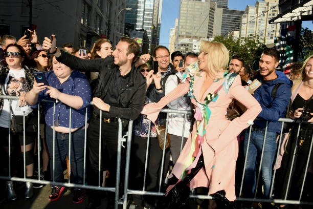 GagaMediaNet's tweet photo. More photos: Lady Gaga arriving at #TIFF for the #GagaFiveFootTwo premiere in Toronto, ON! https://t.co/scPs74Niby
