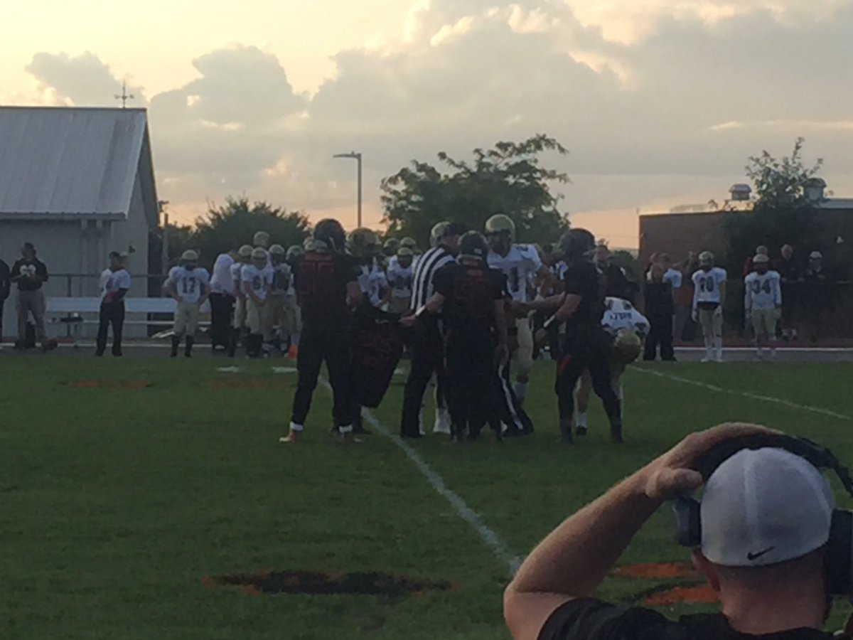 AkronHSSports's tweet photo. Captains on the field carrying #25 jersey https://t.co/YiSn3nLpwt