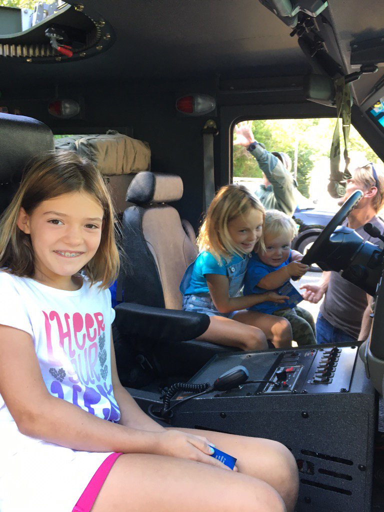 ConcordMAPD's tweet photo. Future SWAT operators checking out @NEMLEC SWAT vehicle and equipment #CPDOpenhouse #community https://t.co/SzZxgNvMqm