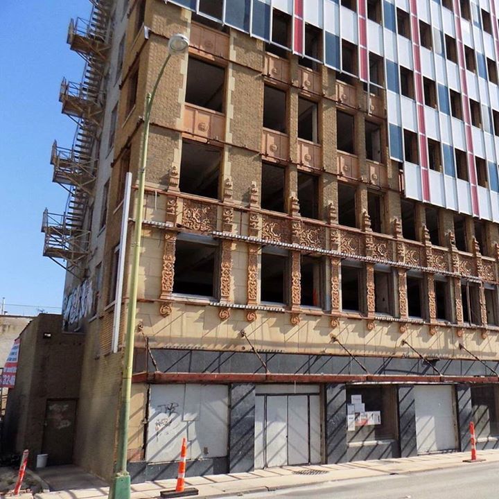 1960s over-cladding is removed from a 1920s office building in San Antonio. 
h/t reddit