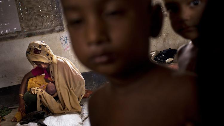 chicagotribune's tweet photo. Hunger spreads in Rohingya refugee camps as food stocks dwindle, and "more and more people are coming” https://t.co/Xw0EkacTQd https://t.co/kByRf02NpD