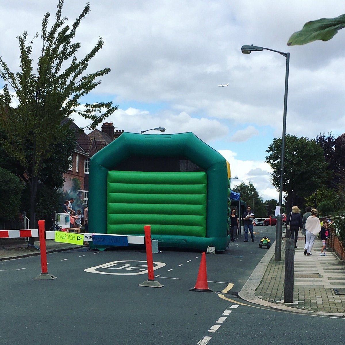 AnnaEDekowski's tweet photo. Well my road is looking rather fun today. Shall I ask them to keep it for my birthday next week?! #bouncycastle #itsmybirthdaynextweek πππ https://t.co/3p3Md4JGKM