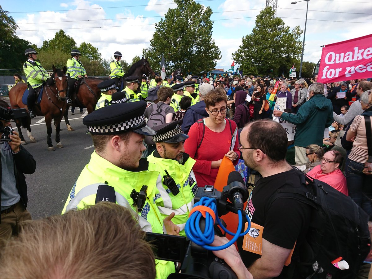 The Quakers outwitting the coppers, quoting the 1936 Public Order Act which forbids breaking up a religious ceremony #StopDSEI 😂