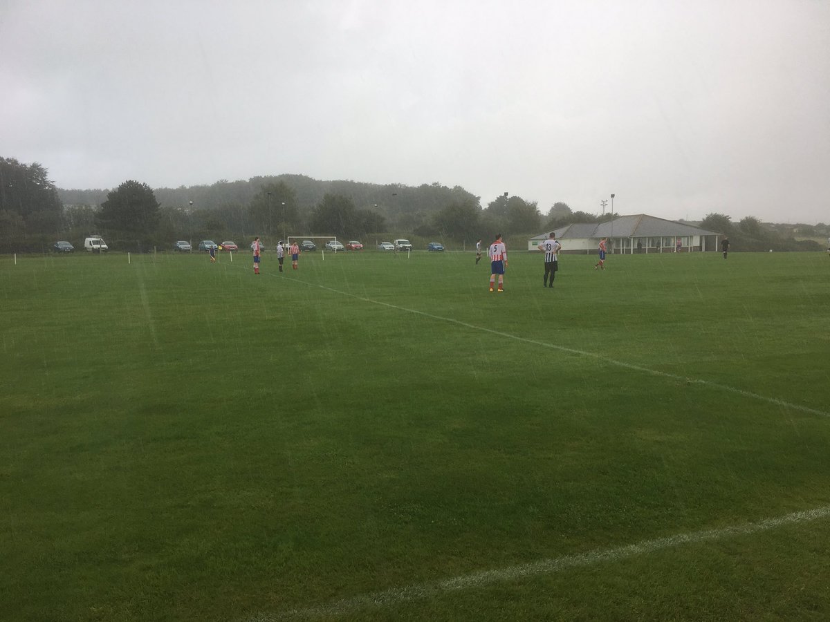 fc_cranborne's tweet photo. Rain starting to fall heavily in Milborne. Still 1-0 to the hosts. #CorCra https://t.co/Dlx6cWOi8g