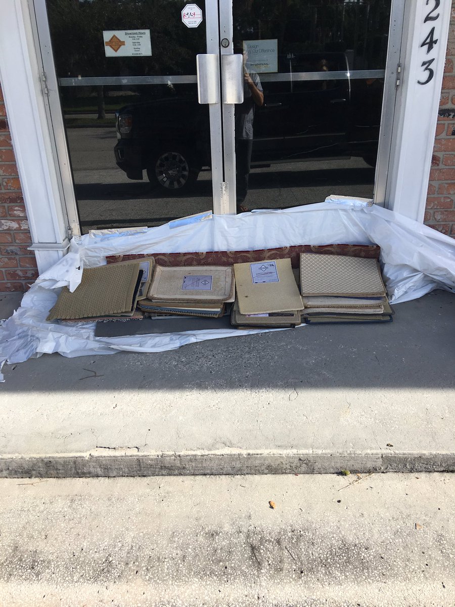 Gcortho's tweet photo. Because nothing stops flooding like carpet samples. Sorry I had to take a photo. #irma2017 #carpetsamples #heresyoursign #tampastrong https://t.co/k8SIULr8D3