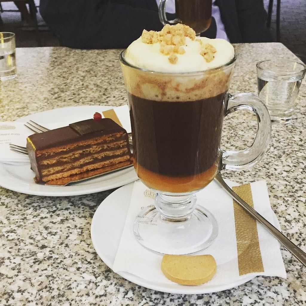 WiseHypocrite's tweet photo. Budapest nailing the sweet stuff. #Gerbaud coffee and cake - coffee, brandy, apricot jam and hazelnut whipped cream. #nom #coffee #Budapest https://t.co/Di9kpxsplK