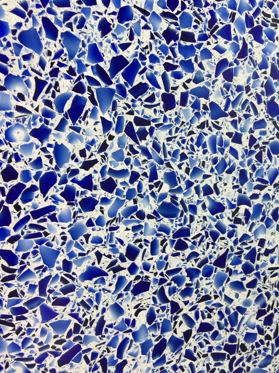 StonevilleUSA's tweet photo. Do you know that each #Vetrazzo #slab requires 8 experts &amp; 560lbs of recycled glass to make? This one uses all Skyy Vodka Bottles! #art #bar https://t.co/0nyQjdBwcV