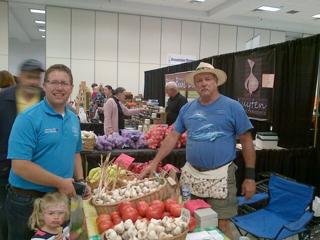 EleanorRenaud's tweet photo. Mark and MP John Nater talking the Corporation changes at the Stratford garlic festival https://t.co/ubHoXMza1y