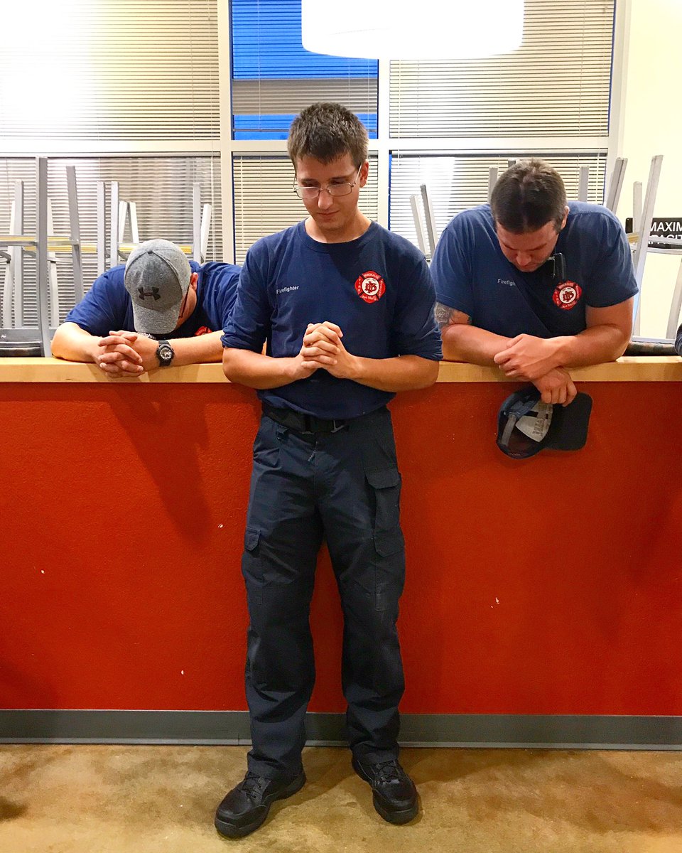 dorothy_edwards's tweet photo. Immokalee Fire and Rescue pray together during their logistics meeting as we begin to feel the arrival of Hurricane Irma @ndn #HurricaneIrma https://t.co/yn9ESNzLvL