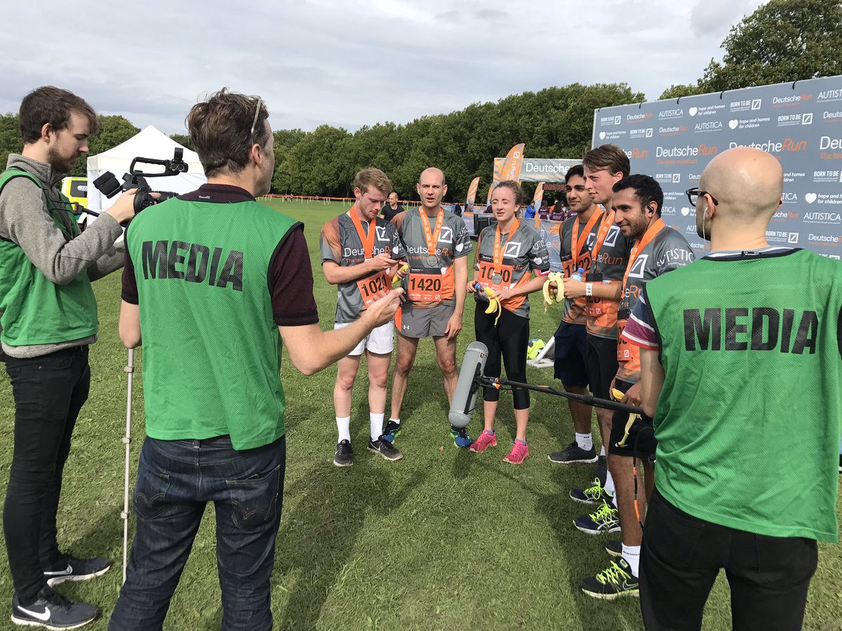 HopeandHomes's tweet photo. Our first #DeutscheRun finishers! Amazing effort and rightly surrounded by the assembled media. https://t.co/zmt4c7aKd1