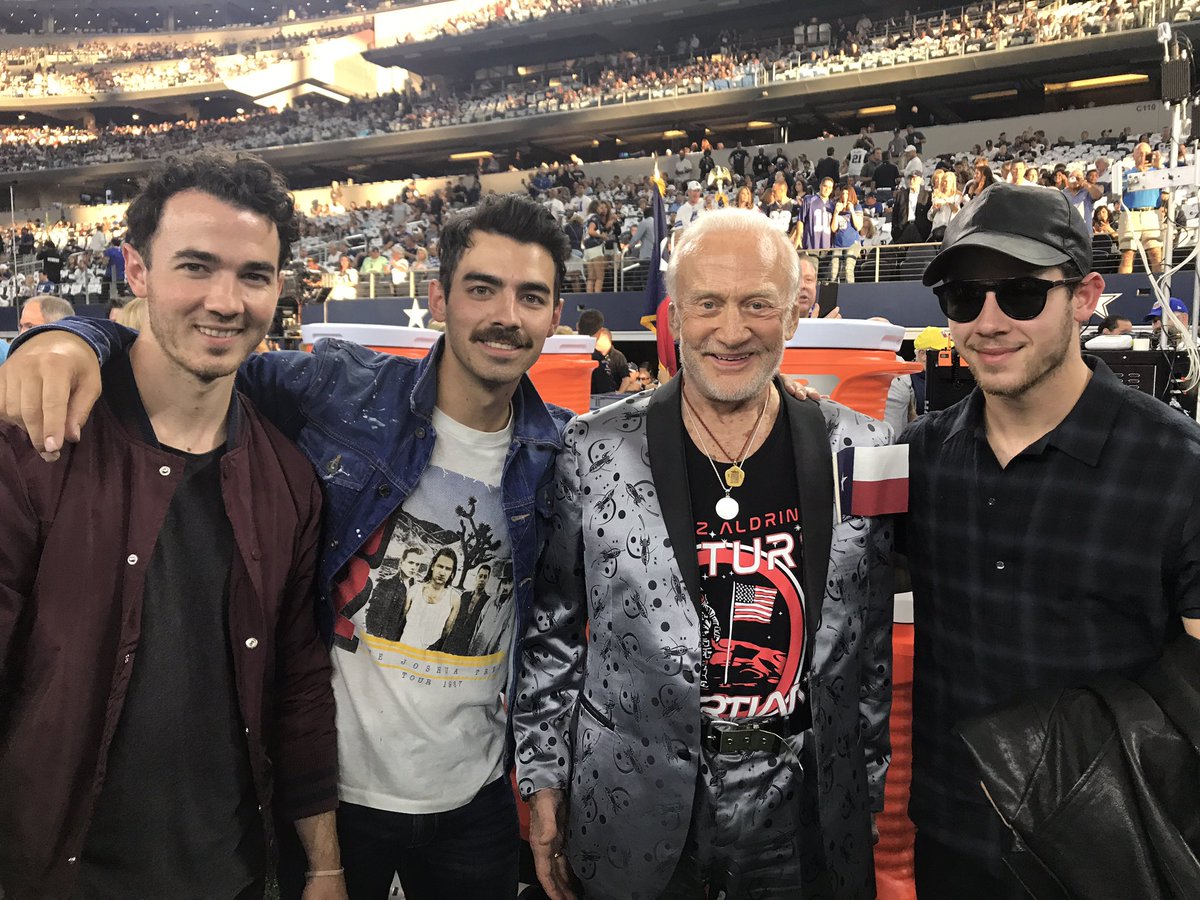 TheRealBuzz's tweet photo. I met the Jonas Brothers at the @dallascowboys game. Apparently they're hot stuff because my Mission Director @Buzzs_xtina said so. https://t.co/Hg0yrX65gm