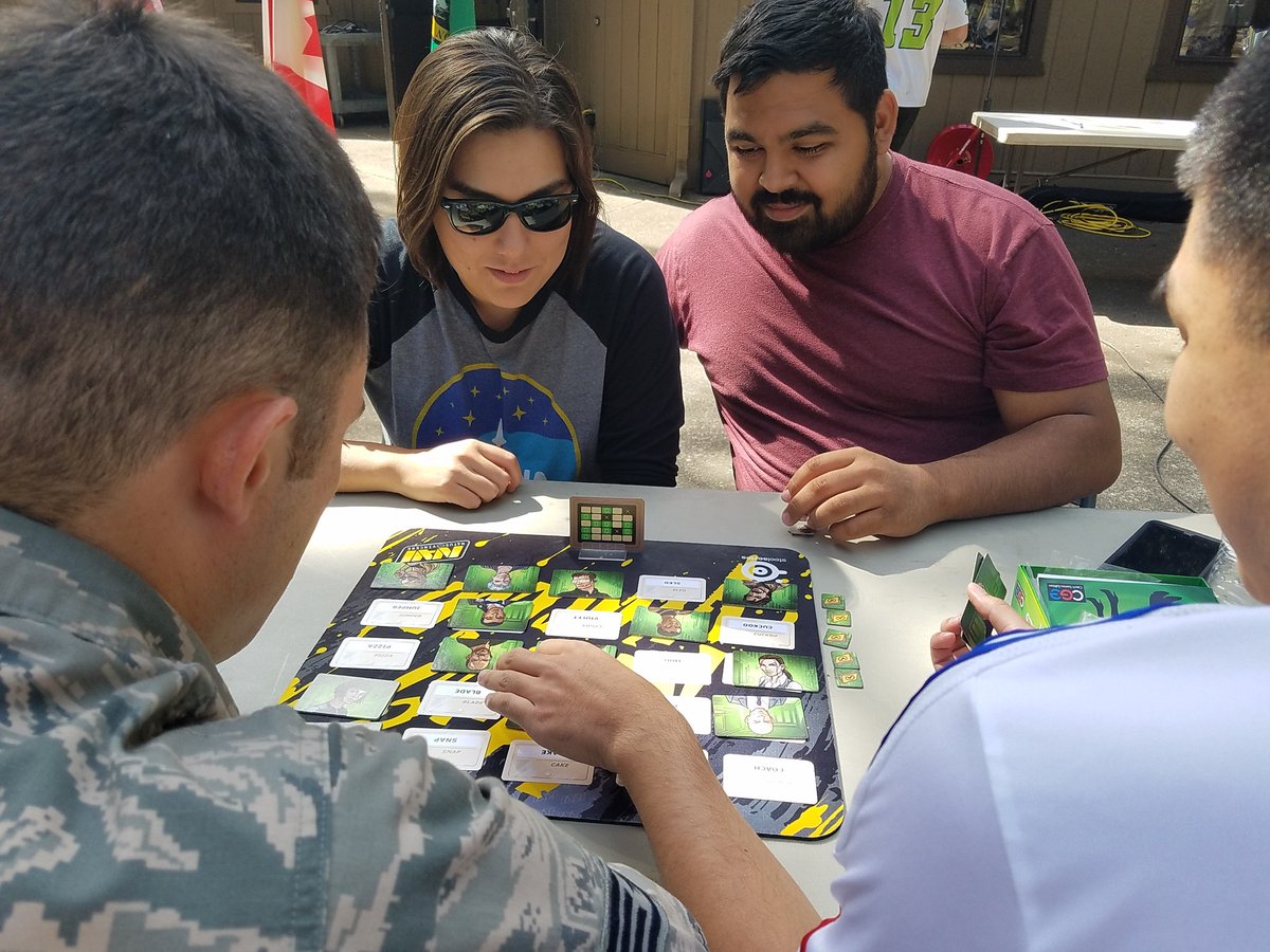 endAlzGameNight's tweet photo. Two of our amazing volunteers getting prepped for #GNTR17 with a bit of Codenames: Duet from @czechgames! https://t.co/2HbHDoECid