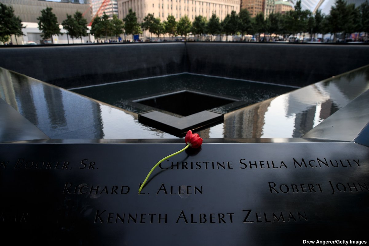ABC's tweet image. Today we remember the lives lost on 9/11. These photos were taken at the North pool of the National September 11 Memorial today #NeverForget