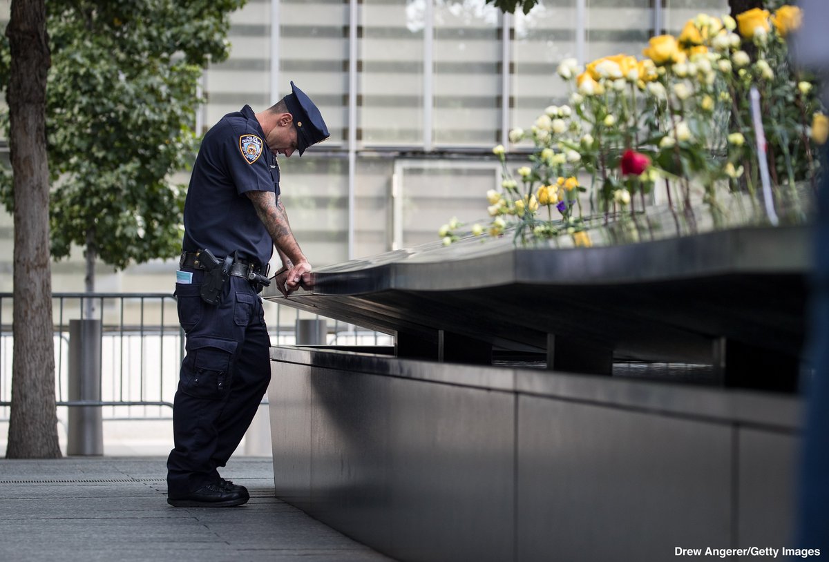 ABC's tweet image. Today we remember the lives lost on 9/11. These photos were taken at the North pool of the National September 11 Memorial today #NeverForget