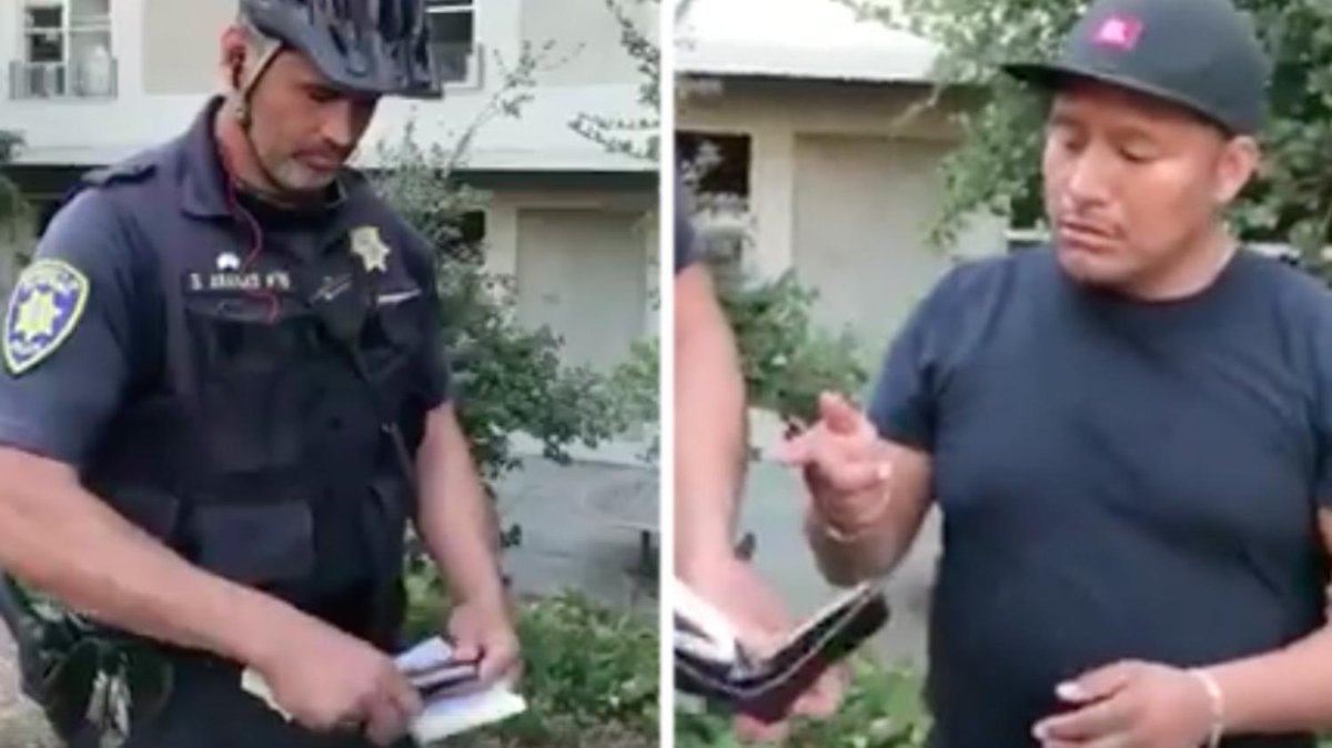 Viral video shows cop shutting down a hot dog vendor and taking cash from his wallet: bit.ly/2wUxHZL