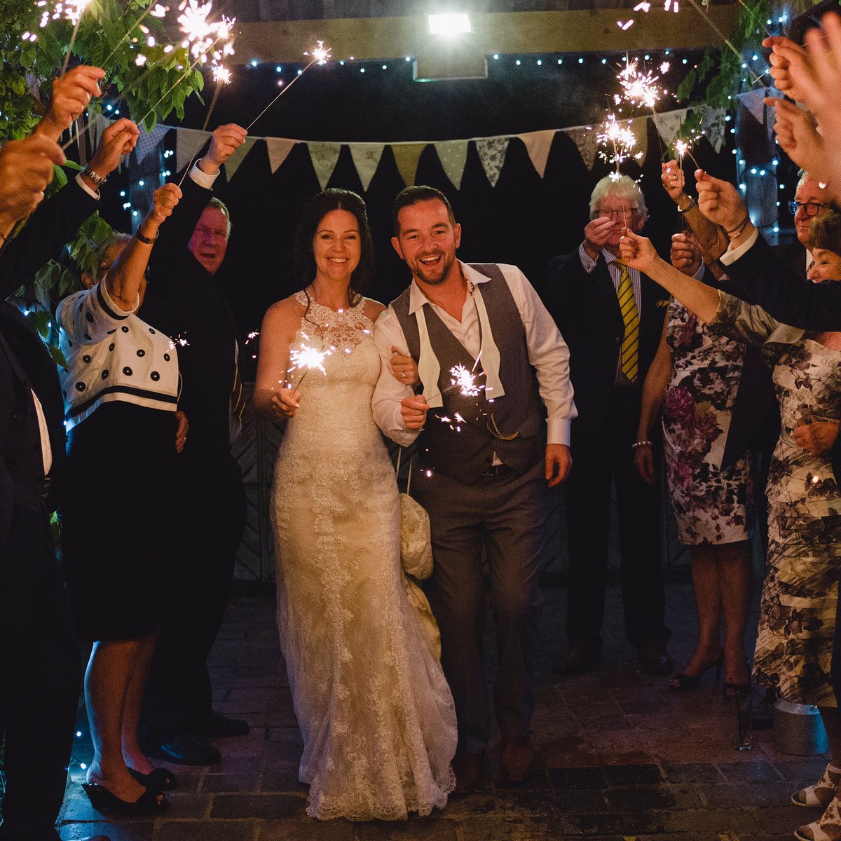 Delighted our #bunting is the backdrop to this enchanting sparkler send off. Stunning #bride in a beautiful <a href="/pronovias/">Aria</a> gown #weddingday
