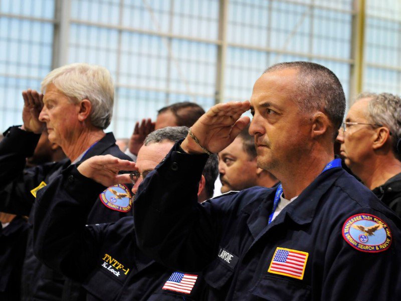 fema's tweet photo. FEMA search &amp; rescue teams supporting #Irma take a moment at Robins Air Force Base (GA) to remember those lost on #September11. #NeverForget https://t.co/sSrBeAfRHY