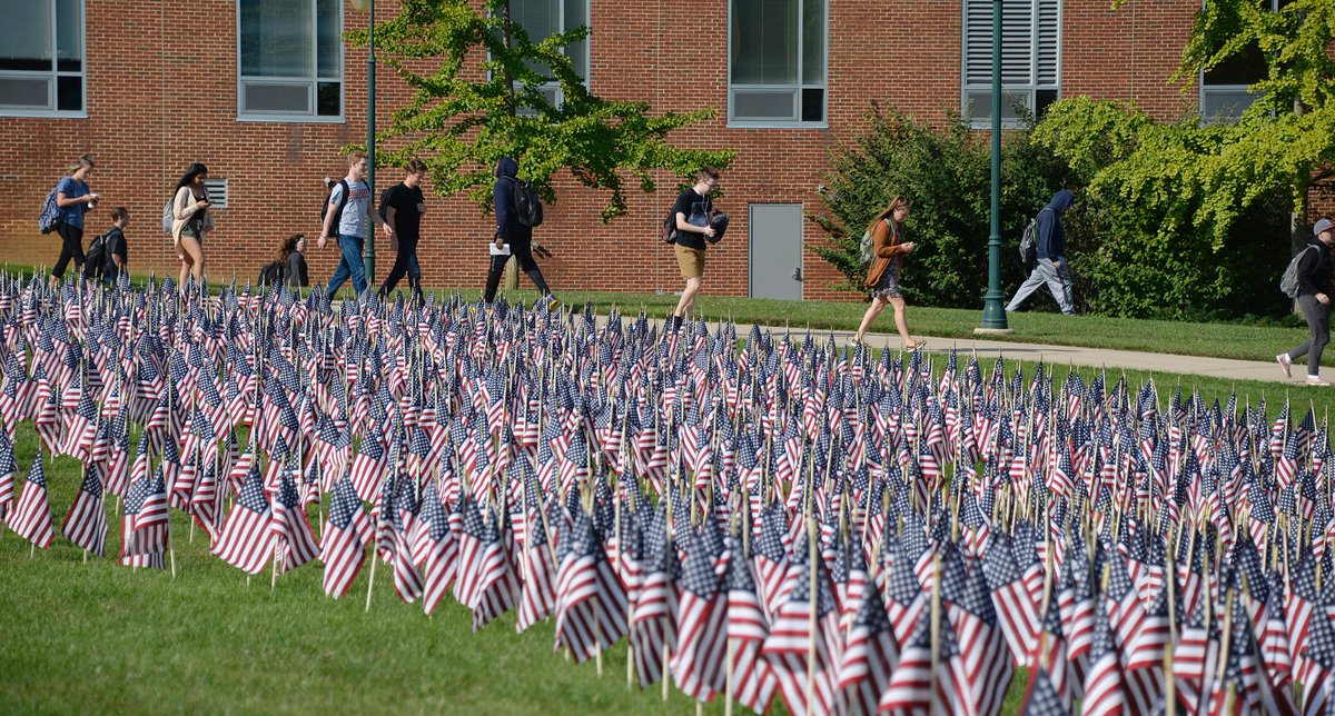 Student Veterans of America hosted a 9/11 ceremony today &amp; placed 2,996 American flags in the quad to honor each victim lost on #September11