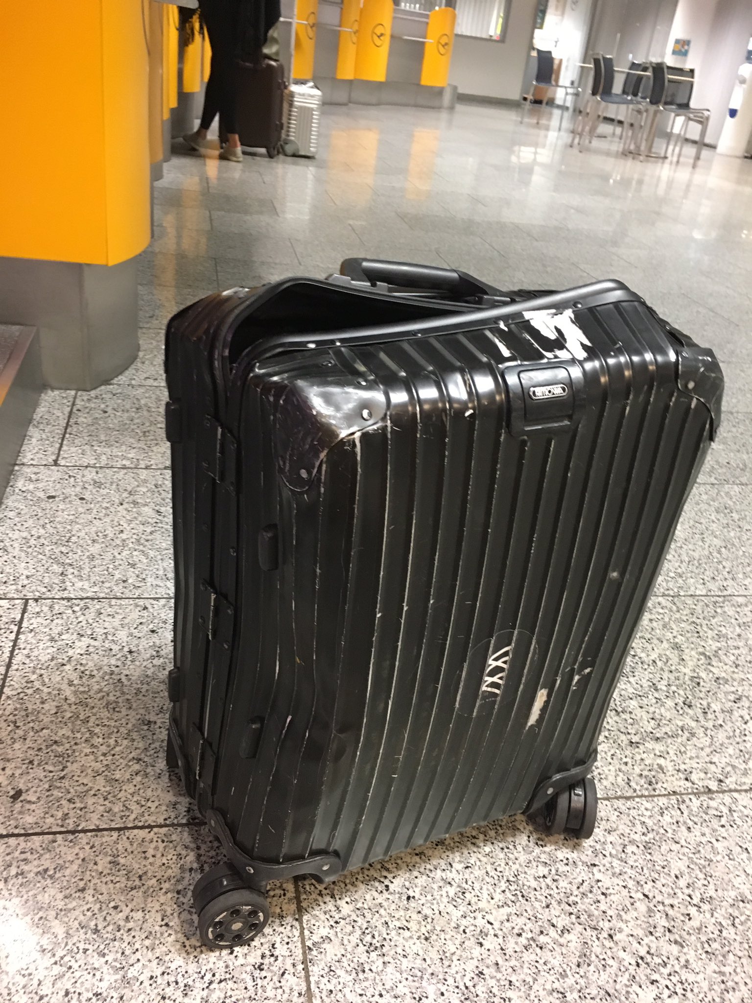 Chris Liebing Ⓥ on X: someone rolled over my luggage at the airport.  Thanks to @RIMOWA all the beer that I smuggled is still fine 🍻   / X