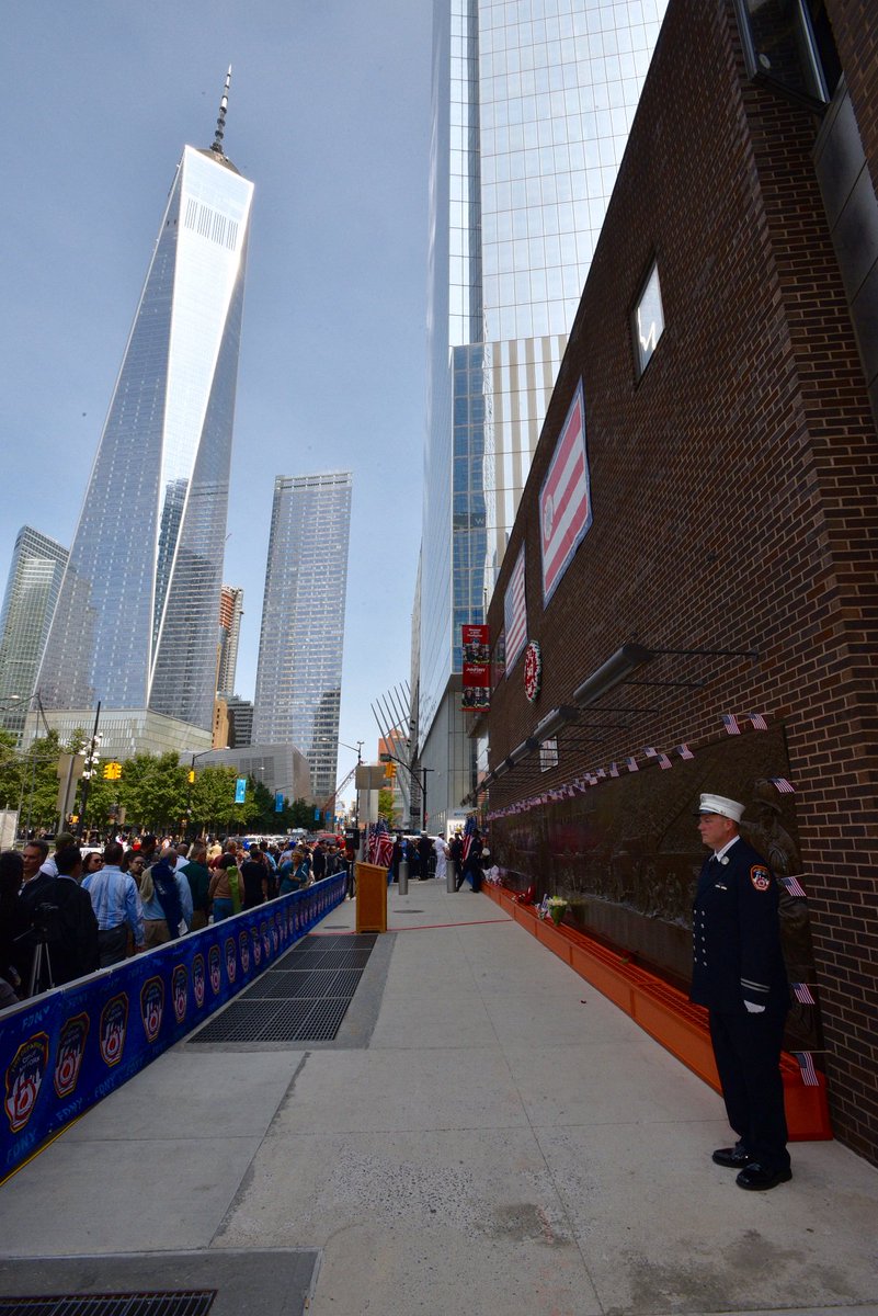 FDNY's tweet image. #FDNY Honor Guard stands outside the Tribute Wall at #Engine10 and #Ladder10