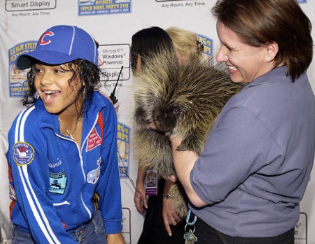 Actress and Singer @ChristinaMilian with a porcupine at the 2003 Super Bowl Party at the @sandiegozoo