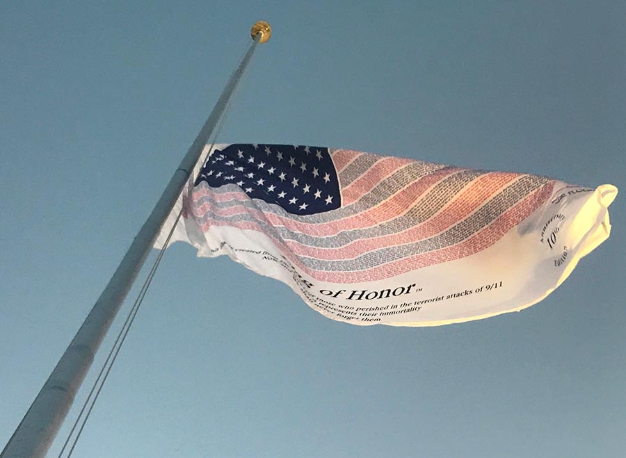 PPLCorp's tweet image. The Flag of Heroes™ is flying at half-staff atop the #PPLTower to honor the 2,977 lives lost in the Sept. 11, 2001 attacks. #NeverForget