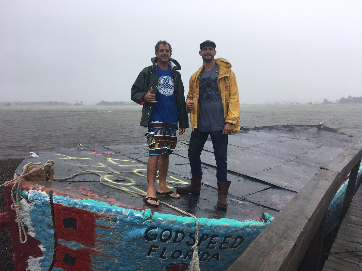 HarveJacobs's tweet photo. #Irma ripped the Folly Boat from its foundation and sent it crashing into Chris Johns' dock. He and a friend managed to tie it up #chsnews https://t.co/hYJQYuQai0