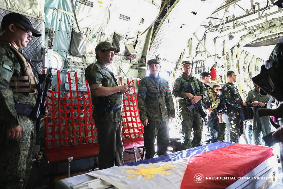 pcogovph's tweet photo. Pres. Duterte pays last respects to fallen Capt. Sandoval. #DefendRepublic https://t.co/tyRwOzKjMU
