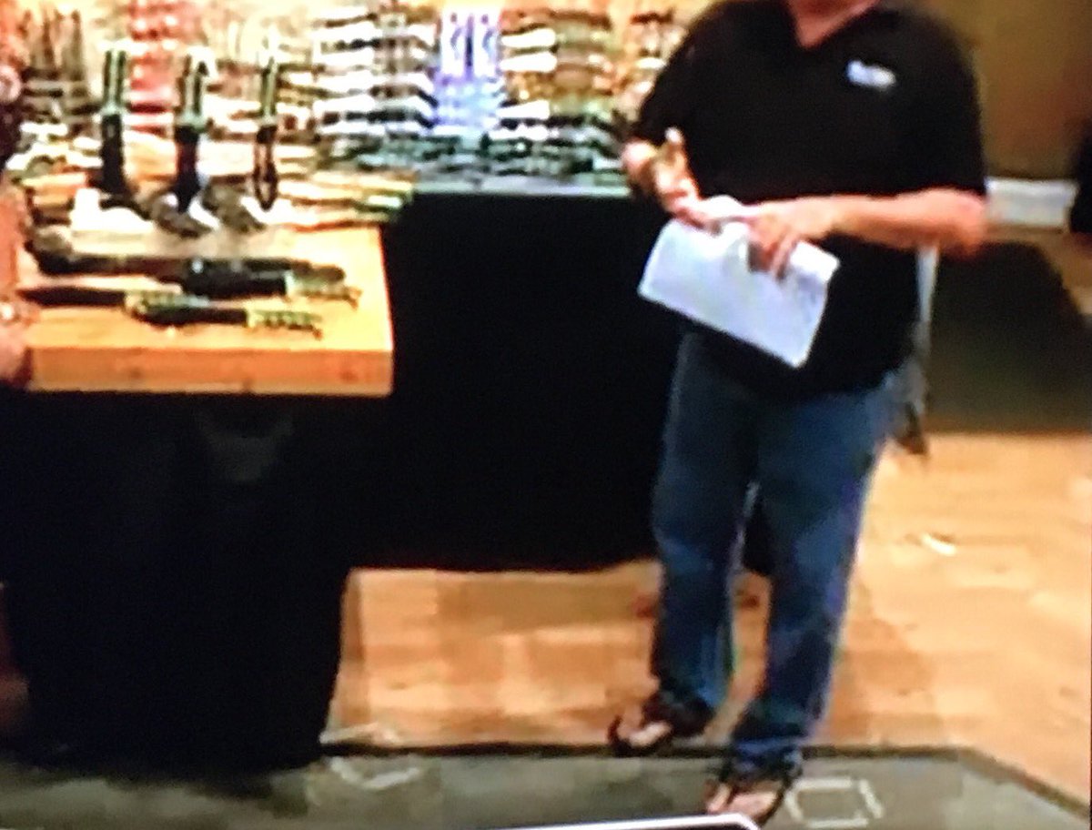 guys wearing flip flops and jeans