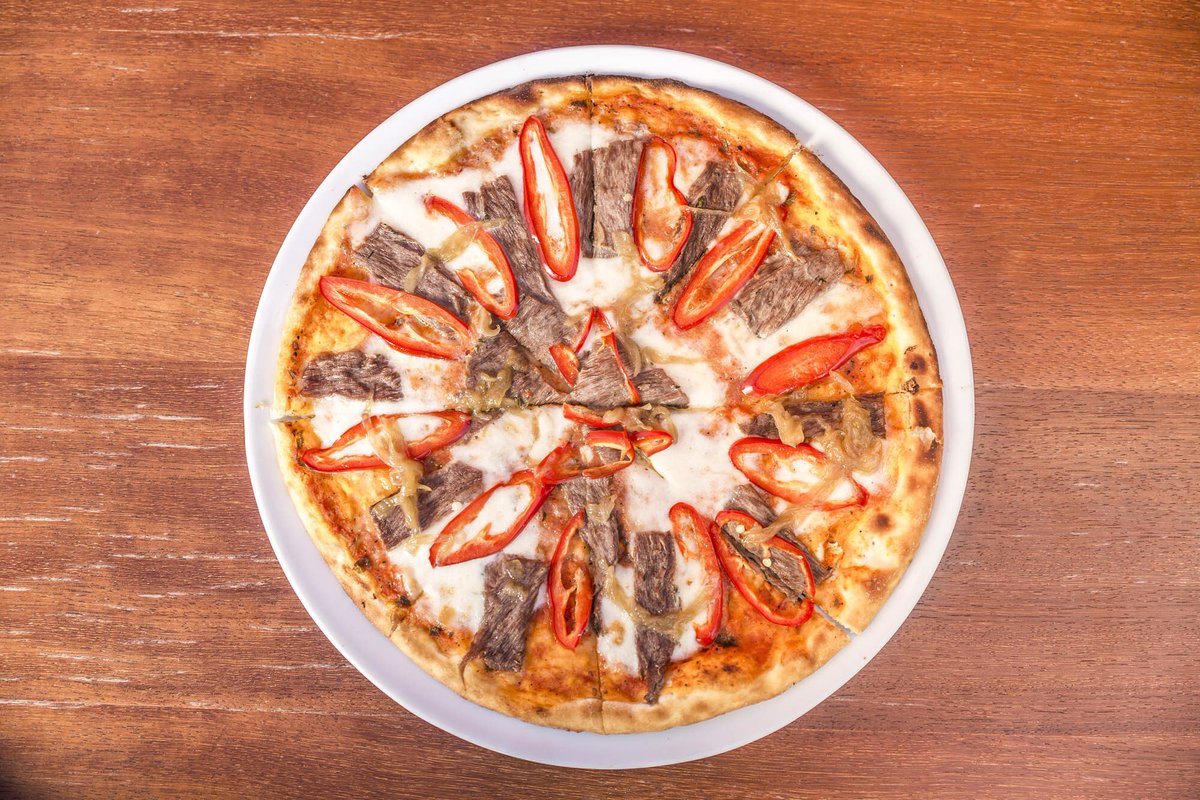 This is what we call a perfect circle. We highly recommend our chef's pizza! #flammbodrum