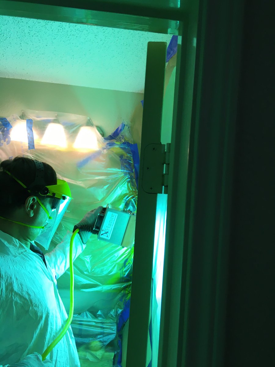 Using the nhance UV light to instantly cure the cabinet finish