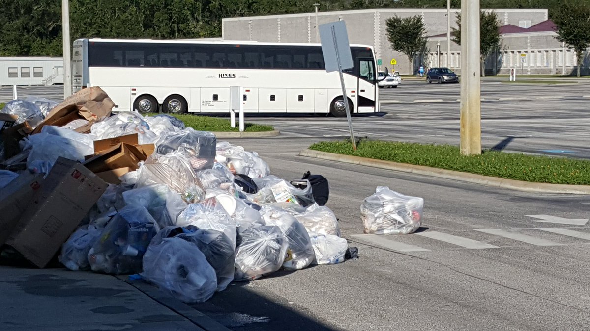 JeffSolochek's tweet photo. Lots of trash piled up at the school shelter. Still more must be removed. #tbtbacktoschool https://t.co/mJXfk8fB4S