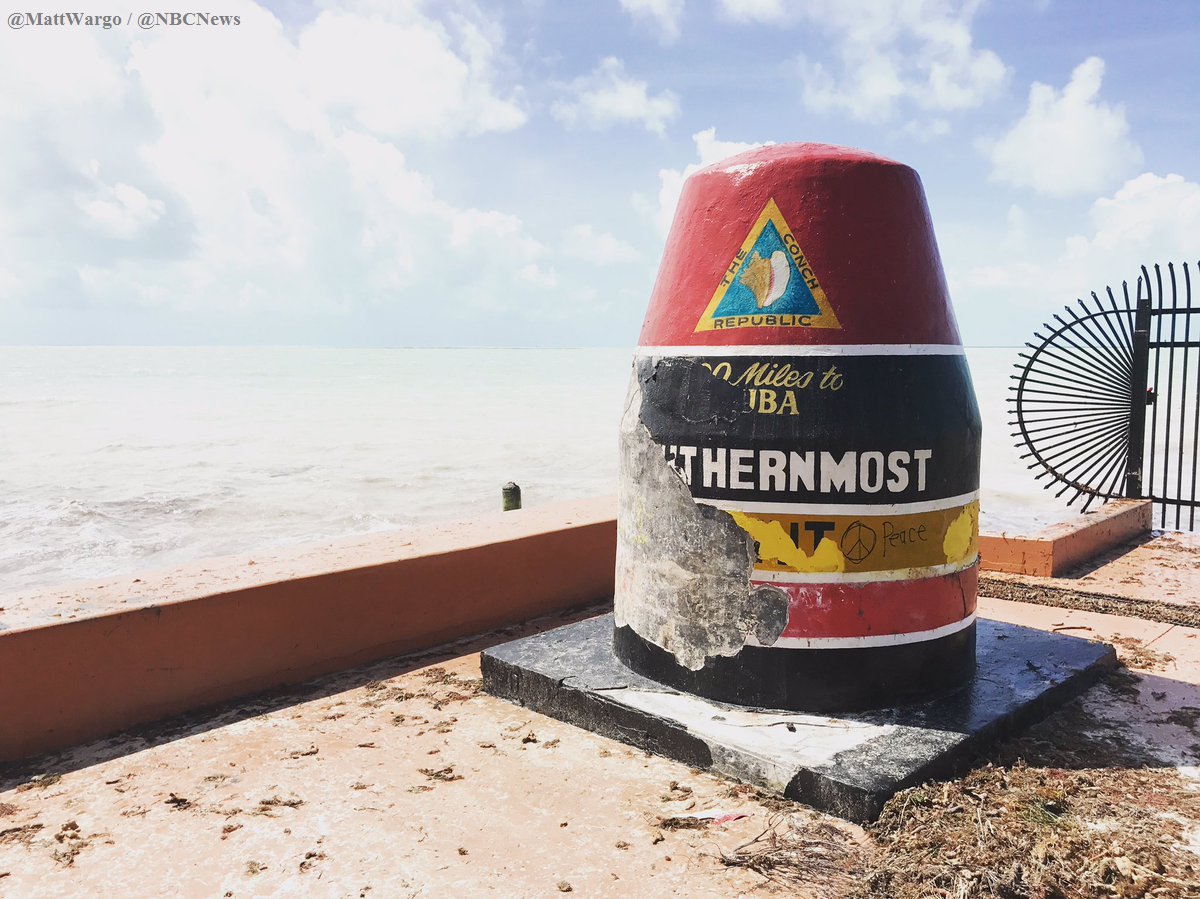 NBCNightlyNews's tweet photo. .@NBCNews crew finds "Southernmost Point Continental U.S.A." landmark in Key West made it through #Irma with superficial damage - @MattWargo https://t.co/6yWwJeDg6C