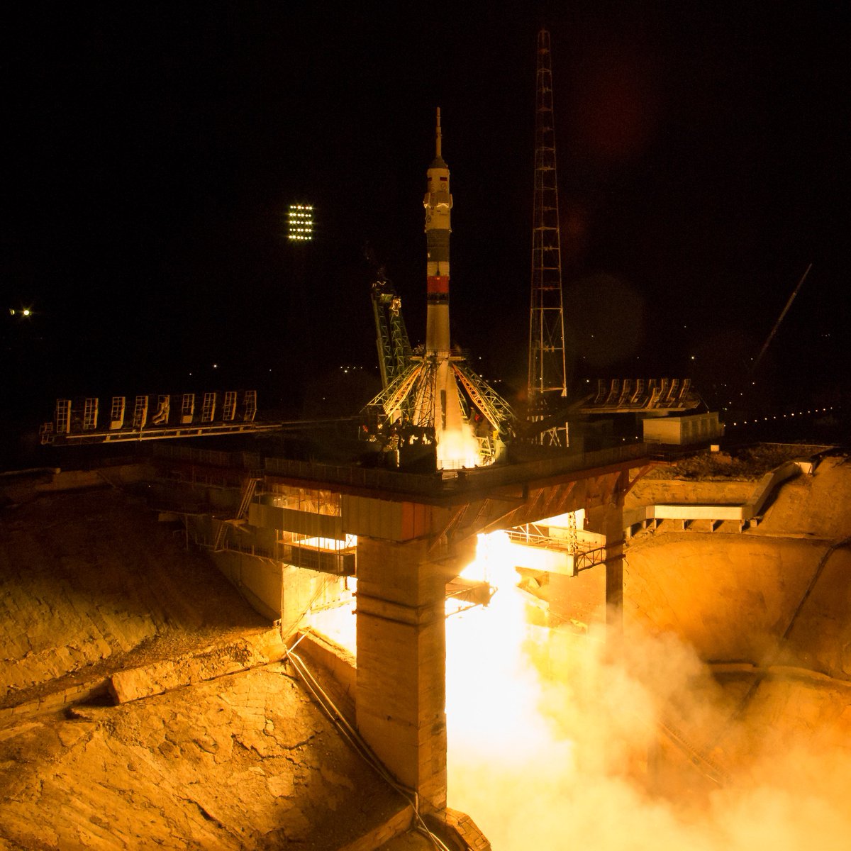 Space_Station's tweet photo. Two astronauts and a cosmonaut are about to dock to station at 10:57pm ET. Watch @NASA TV now for live coverage... https://t.co/qpyi2LM11l https://t.co/CiliAdoFV4