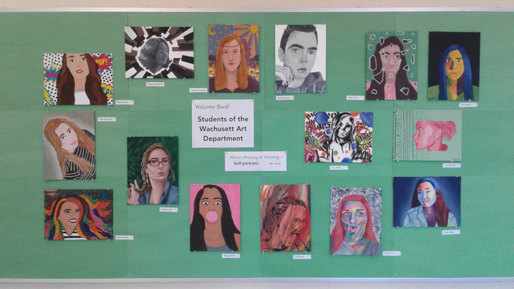 Faces of Wachusett. Self portraits by Ms Breen's Hon. Drawing and Painting class hang in the Art hallway.