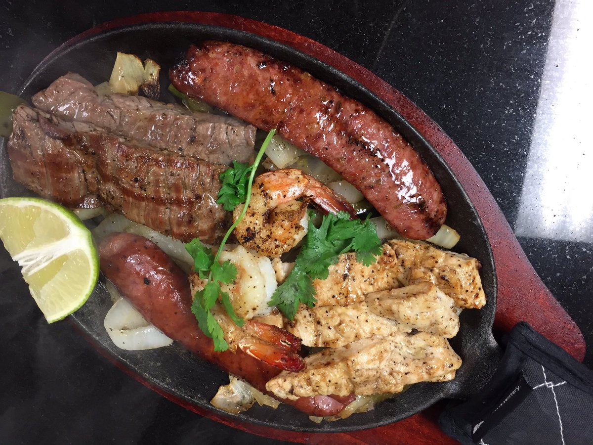 ABC13CourtneyC's tweet photo. This is cilantro parrillada... beef, chicken, shrimp, & sausage fajitas! Lots of great flavor!! #YUM #EatBCS @KBTXNews @cilantrobcs #BVTM https://t.co/tienU1biuO