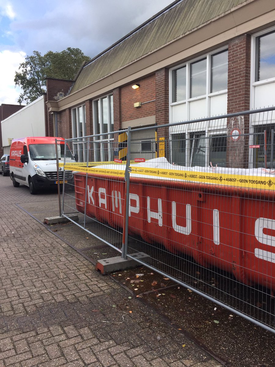 Saneren asbesthoudende lijmlaag bij Ten Cate Nijverdal.