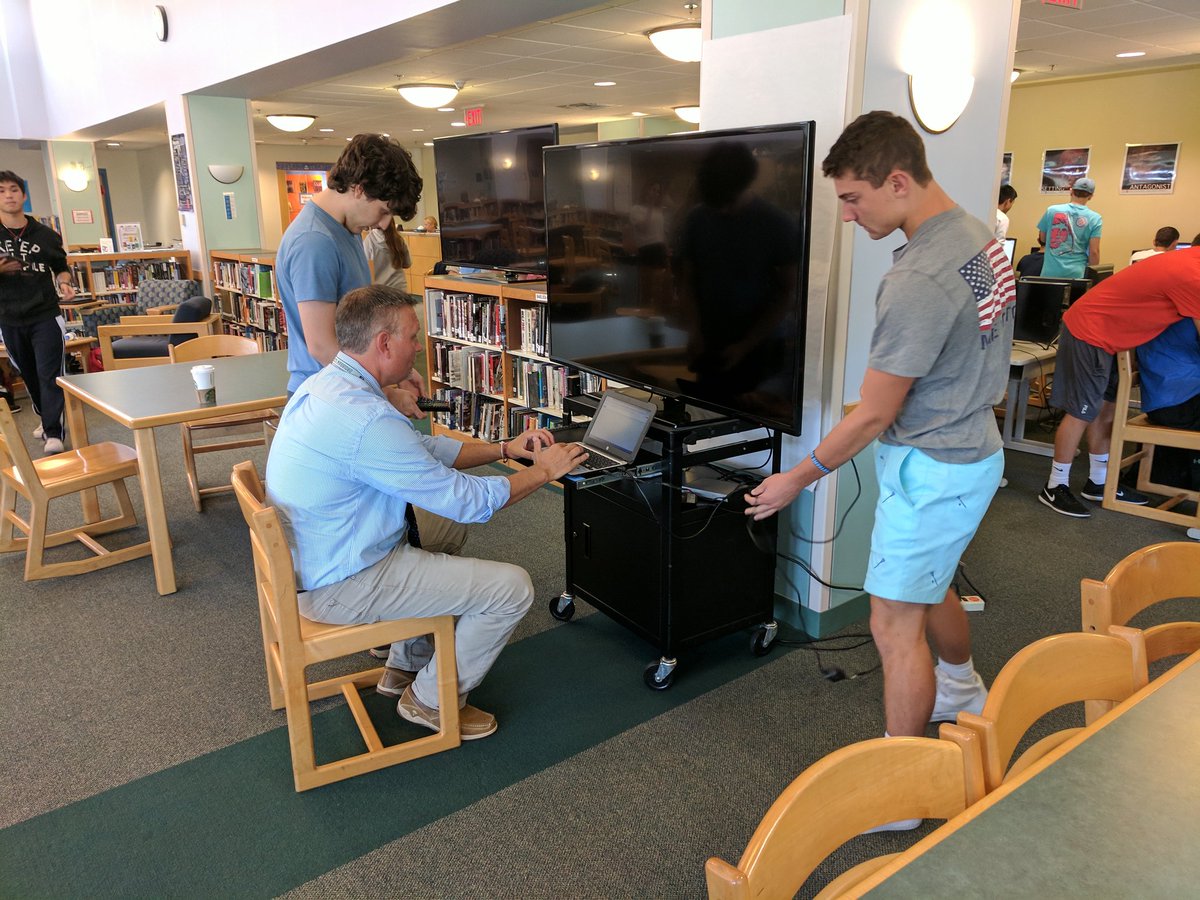 nealman17's tweet photo. The @MHStechhelpdesk students helping @DrWorthley get his tech on for tonight's PTO meeting #medfieldps #puttingmeoutofajob https://t.co/1EkzvQd2HP