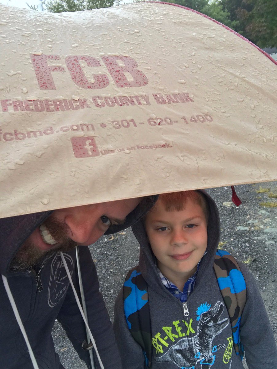 acnbbank's tweet photo. Rain this morning while waiting for the school bus, but FCB had them covered! Thanks, Adam Frey for sending this photo. #communityban https://t.co/N2QALYd9pz