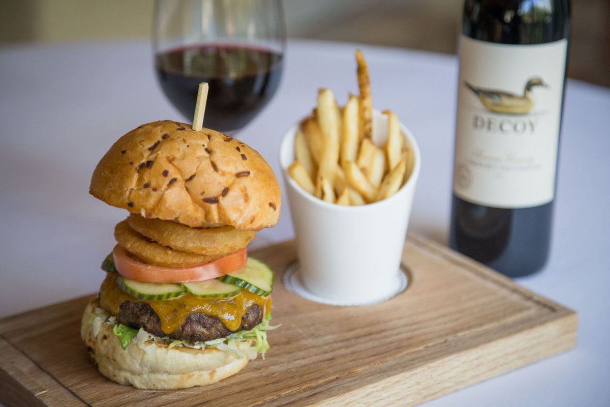 Begin your #u2thejoshuatree2017 evening with a mouthwatering Windsor Burger Royale, fries and #wine for just $20 in Polo Club Lounge. #Nola