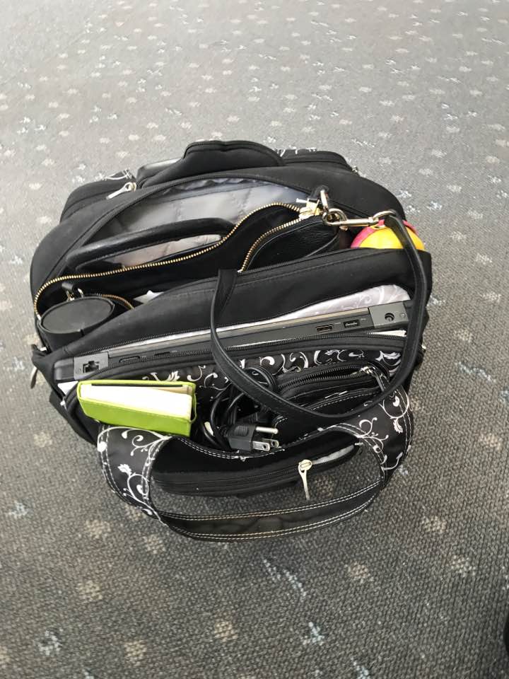PlanetJanet1964's tweet photo. #Unitedairlines wanted $50 to check my purse at gate.  I stuffed in my briefcase.   Do they really need more bad PR like this? https://t.co/HS9ODfWzgY