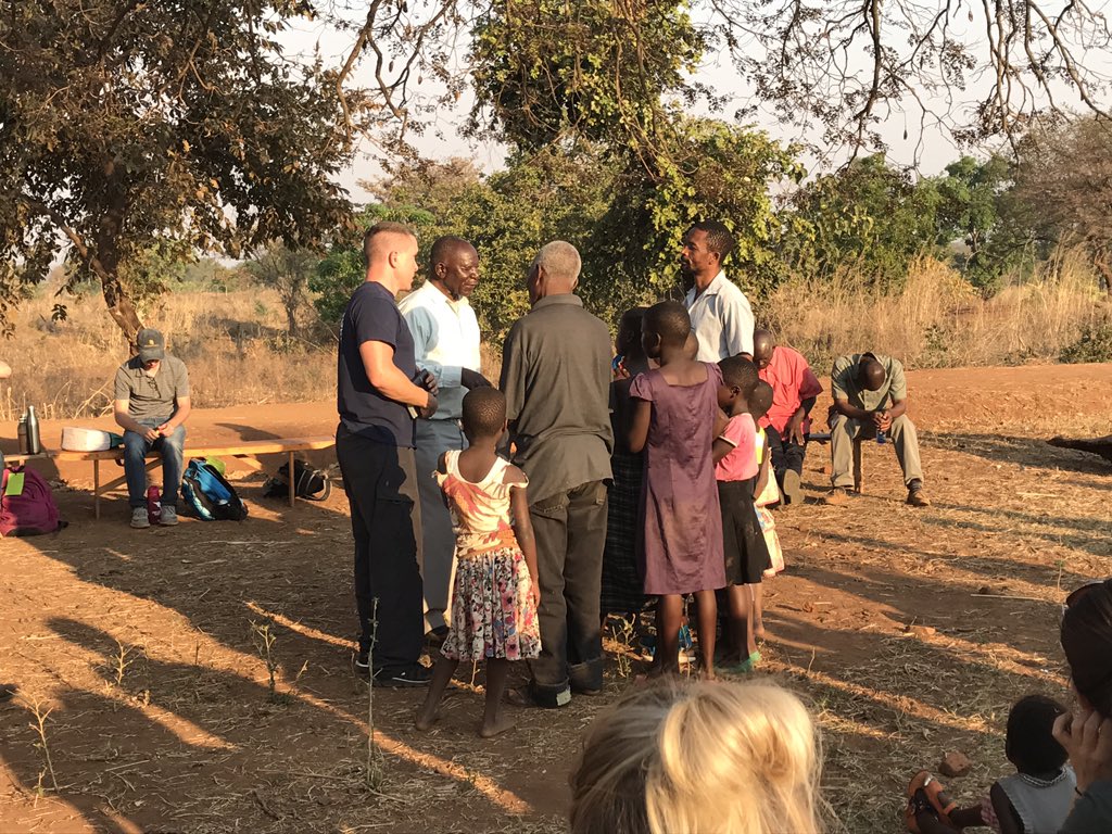 BradleyGraves's tweet photo. Village Evangelism Day in Malawi.  We saw families come to Jesus  under shade trees, sharing the gospel and spontaneous worship service https://t.co/xY1IneMIRa