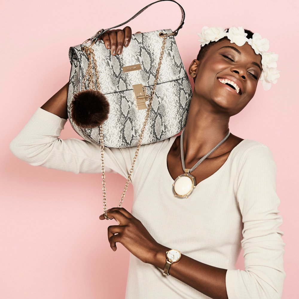honey_acc's tweet photo. Our faux snakeskin bag is super sexy and  THE bag of the season . We had to put it on the front cover of the Thando Collection <3 https://t.co/rCdkqpk8kg