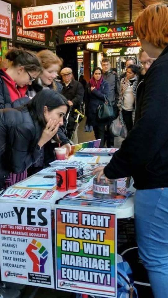 Swanston St Melbourne today. These Yes campaigners didn't get the memo that it ends with a wedding ceremony.