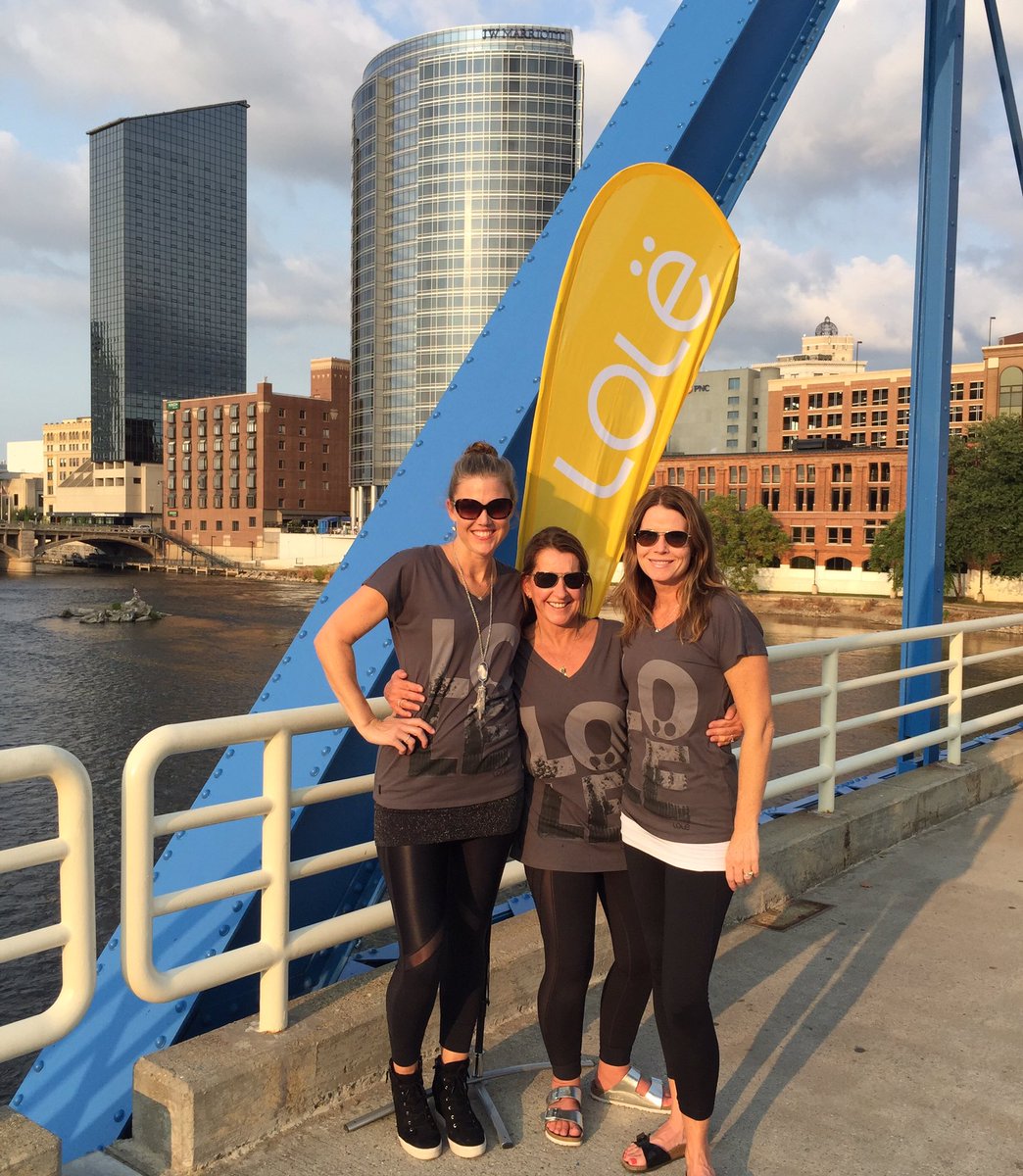 Lolë gals setting up Pure Barre on The Blue Bridge to benefit <a href="/PurpleVAI/">Van Andel Institute Purple Community</a>